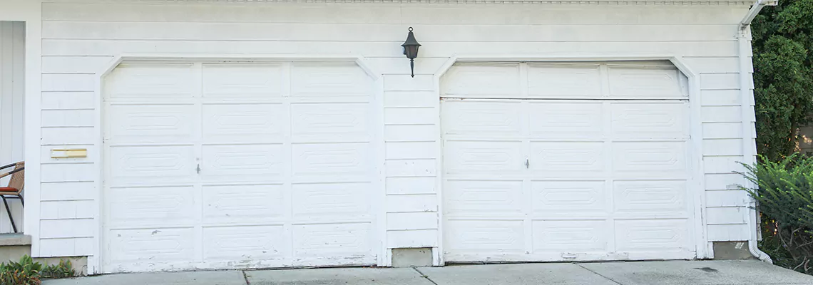 Roller Garage Door Dropped Down Replacement in Vancouver, BC