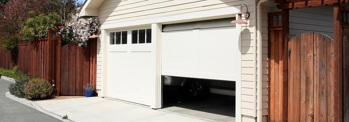 Fix Metal Garage Door Jerking in Vancouver, British Columbia